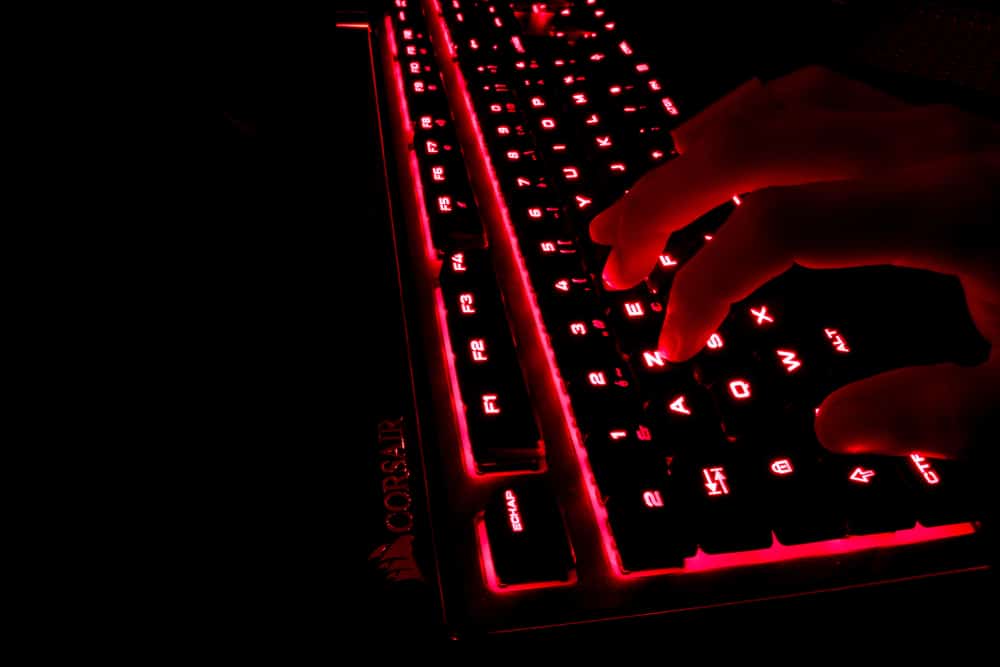 Someone Typing On An Msi Keyboard Having A Red Lightning