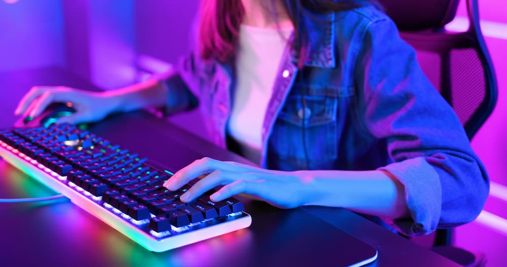 Person Typing On Keyboard