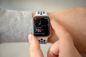 An Apple Watch With The Green Light Showing Heart Rate