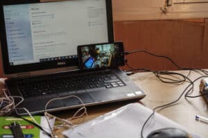Dell Laptop Connected To A Smartphone